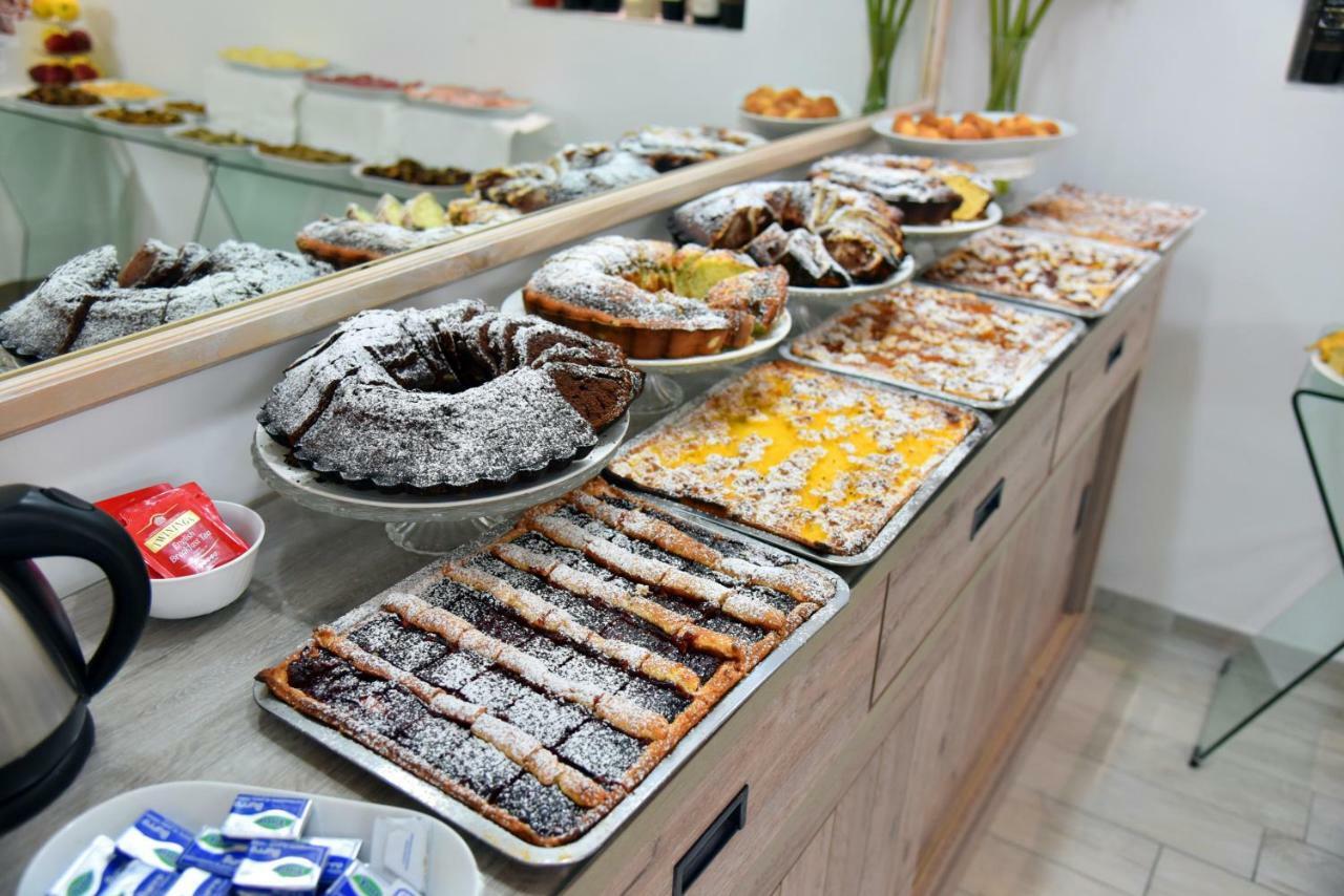 神圣海岸酒店 阿杰罗拉 外观 照片